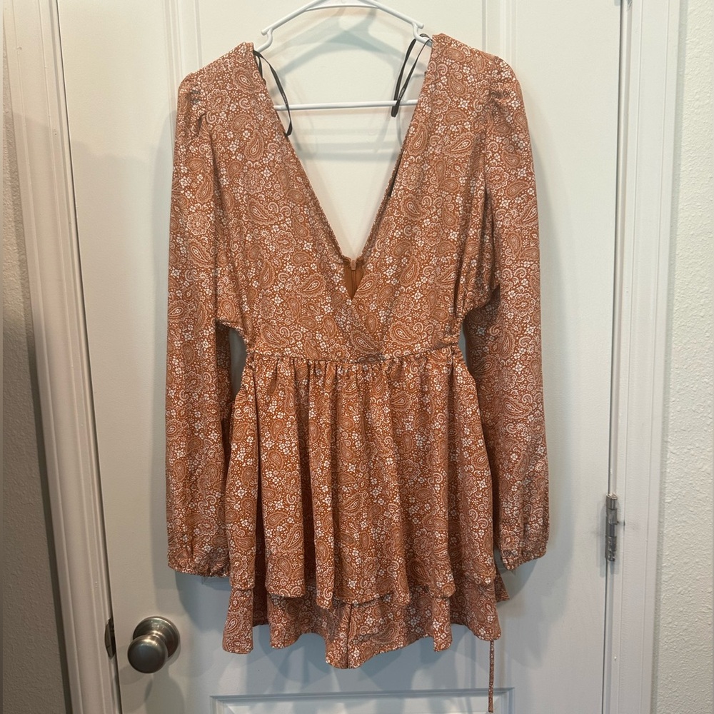 Forever 21 large orange and white patterned long sleeve romper